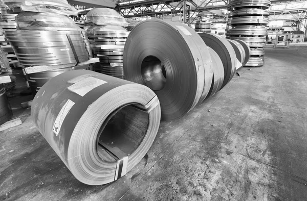 Cold rolled steel coils in storage area ready to feed to machine