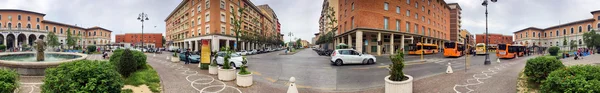 PISA, ITALY - MAY 6, 2015: Central Station Square with tourists