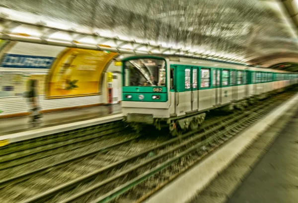 Blurred view of Metro station and train in Paris