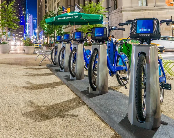 New blue City Bikes lined up