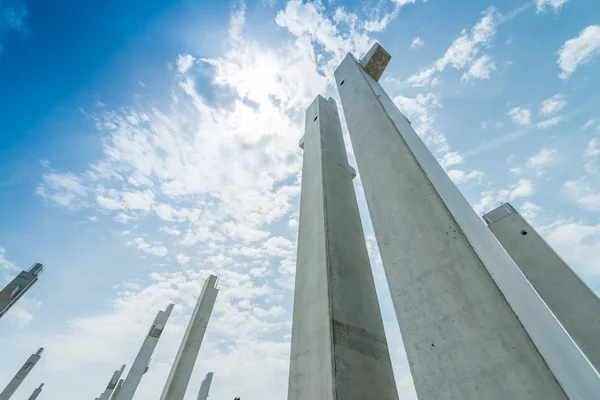 Concrete piles at construction site