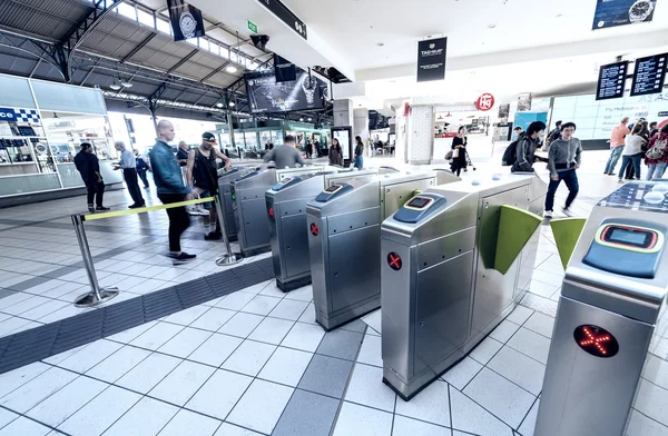 MELBOURNE - OCTOBER 10, 2015: People enter subway gates. Last ye