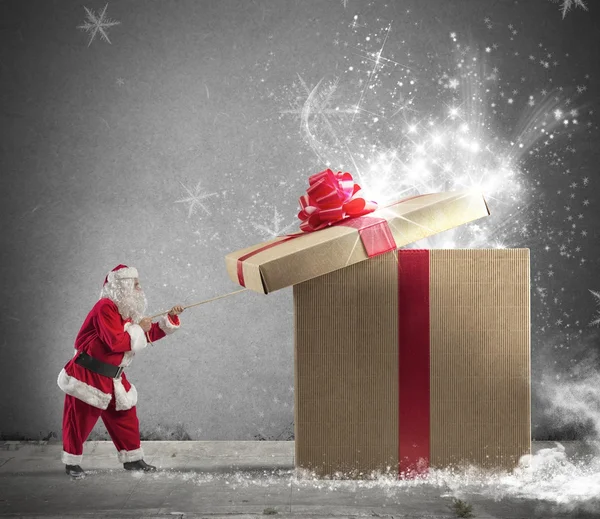 Santa Claus opening gift