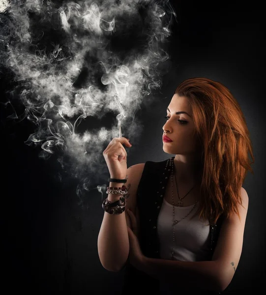 Girl smokes a cigarette