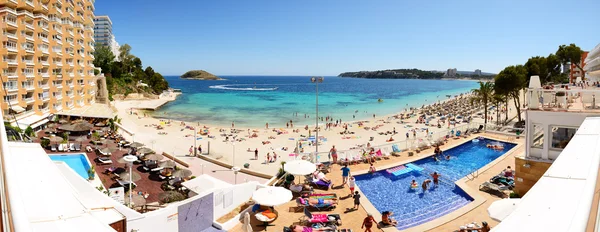 MALLORCA, SPAIN - MAY 29: The tourists enjoiying their vacation on the beach on May 29, 2015 in Mallorca, Spain. Up to 60 mln tourists is expected to visit Spain in year 2015.