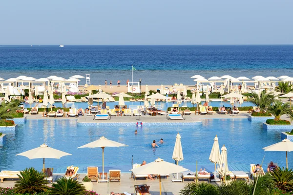 HURGHADA, EGYPT -  DECEMBER 3: The tourists are on vacation at luxury hotel on December 3, 2012 in Hurghada, Egypt. Up to 12 million tourists have visited Egypt in year 2012.