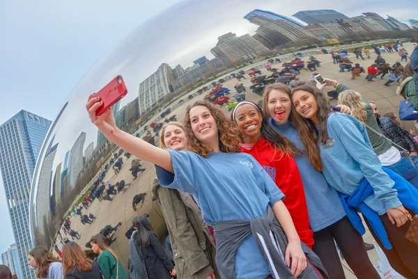 Women taking a selfie near Cloud Gate