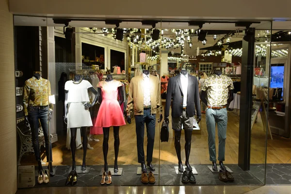 Shopping mall interior with mannequins