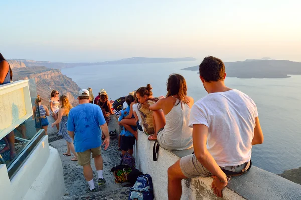People meet sunset on Santorini island