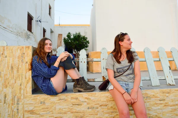 People on streets of Santorini island.