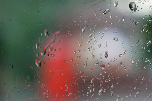 Wet window with rain drops