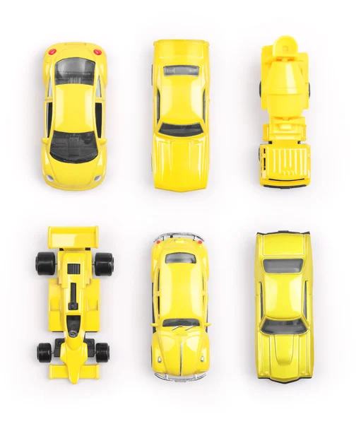 Yellow toy cars on white background