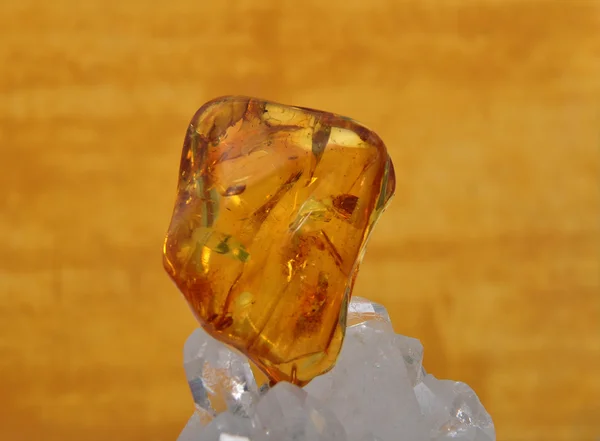 Amber on rock crystal