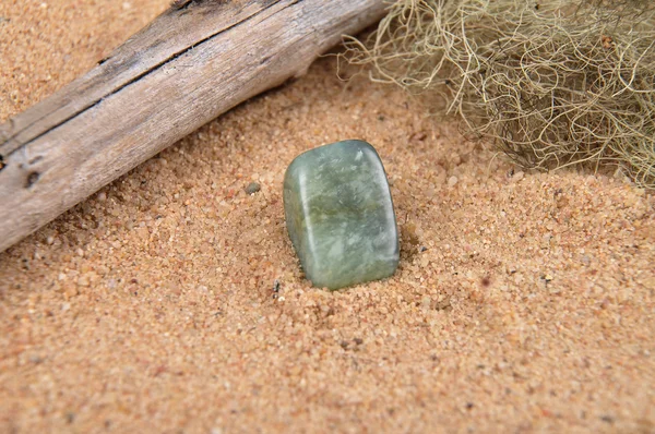 Moss agate on beach