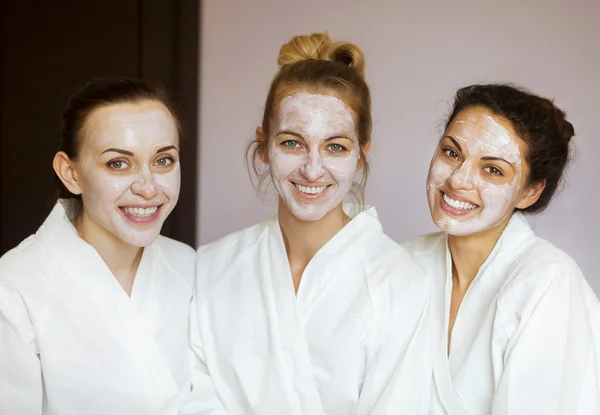 Three young happy women at spa resort