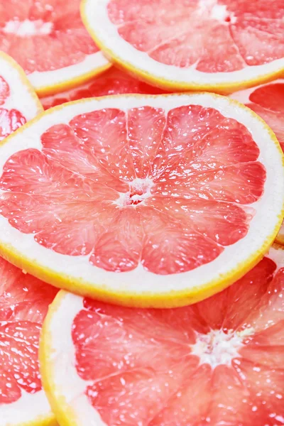 Grapefruit slices background