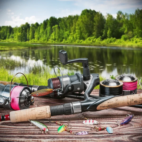 Fishing tackle and accessories on table