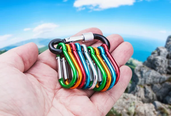 Carabiners for climbing in hand