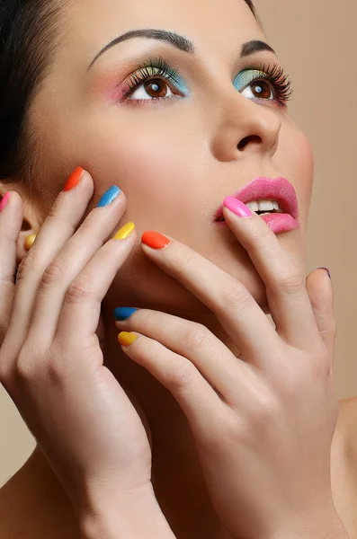 Beautiful Girl with Colorful Nail polish.