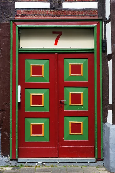 A front door of medieval building in Hameln, Germany.