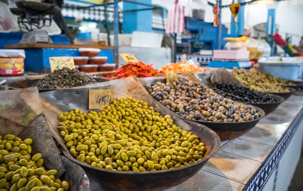 Olives on market counter