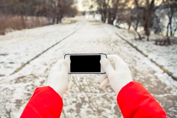 Female hands with mobile phone