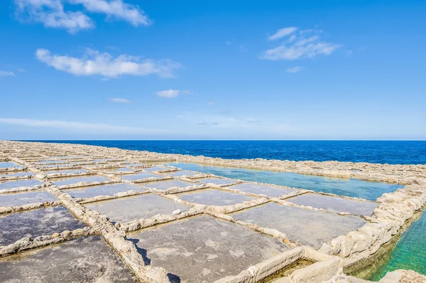 Salt pans near Qbajjar in Gozo, Malta.