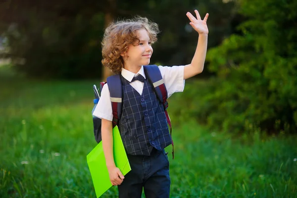 Curly blond student goes to school