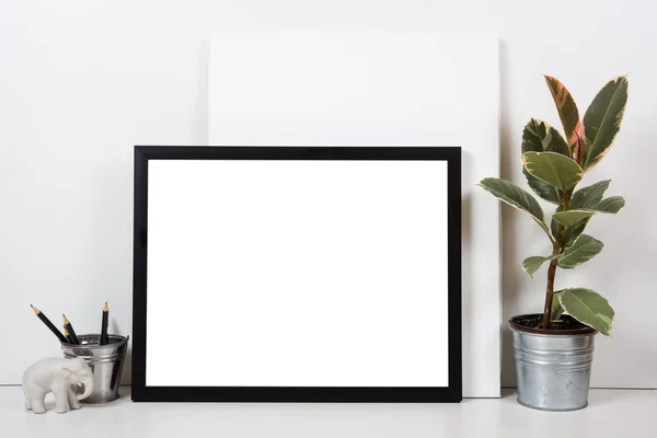 Styled tabletop, empty frame, painting art poster interior mock-