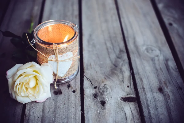 Candle in a decorative jar
