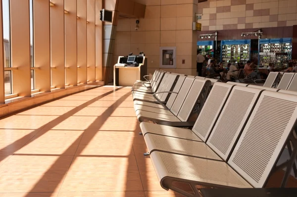 Seating at the Gate of an International Airport\'s Departure Term