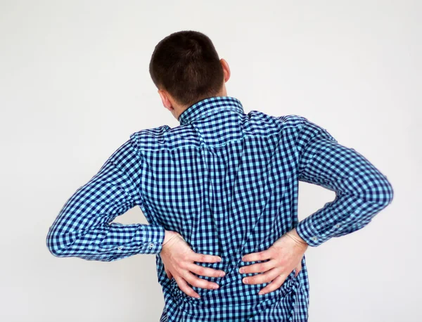 Young man having kidney pain