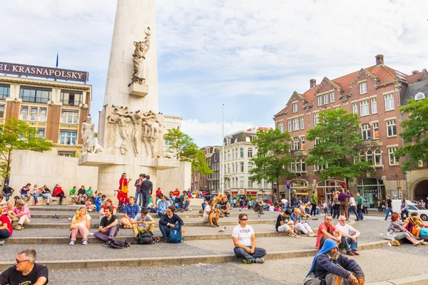 Tourists in the Dam square in Amsterdam, The Netherlands