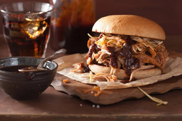 Homemade pulled pork burger with coleslaw and bbq sauce