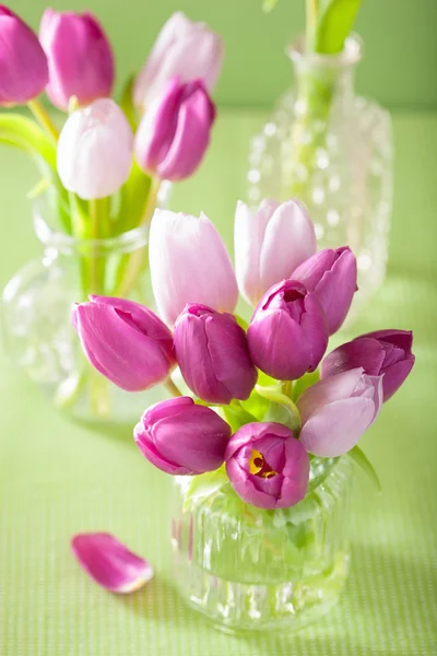Beautiful purple tulip flowers bouquet in vase