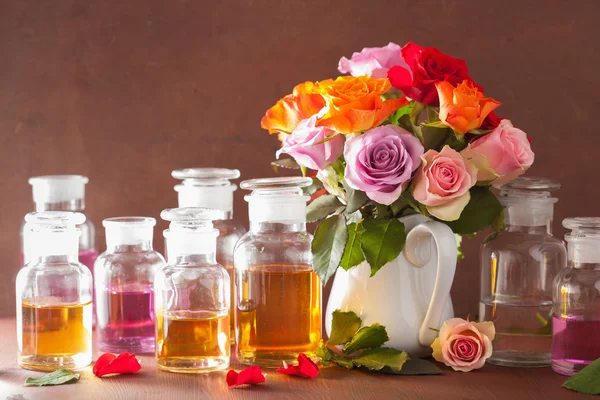 Essential oil and rose flowers aromatherapy spa perfumery