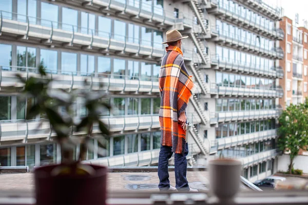 A man covered with blanket