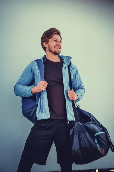 Sporty male in a blue jacket.