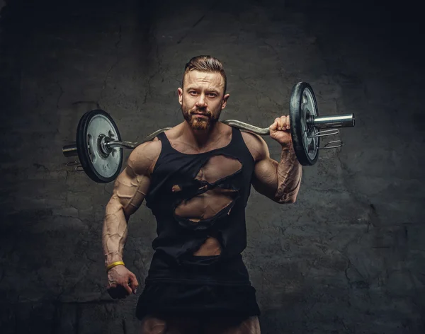 Bearded bodybuilder with barbell