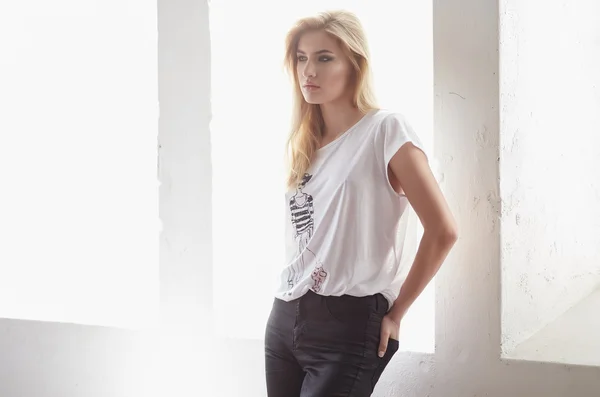 Blond female in a white t shirt
