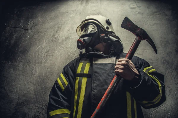 Firefighter in oxygen mask.
