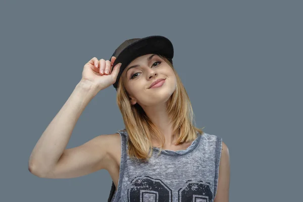 Modern hip hop female in a cap