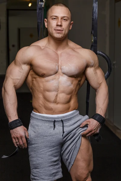 Strong muscular man bodybuilder