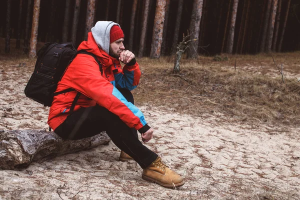 Hiker resting in the forest