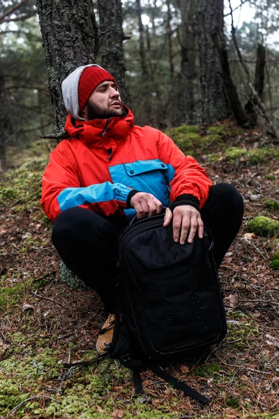 Hiker resting in the forest