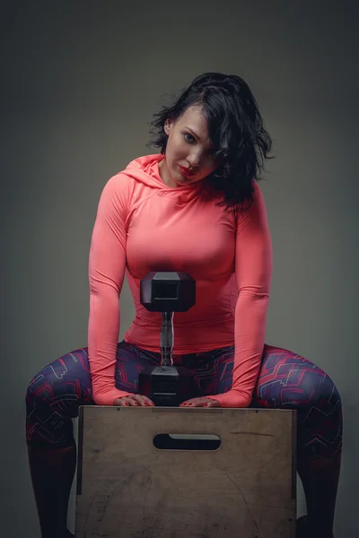 Fitness woman with short black hair