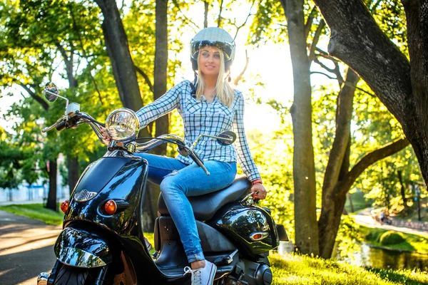 Casual blondy woman in blue jeans.