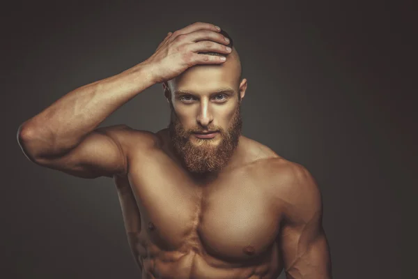 Muscular bearded man.