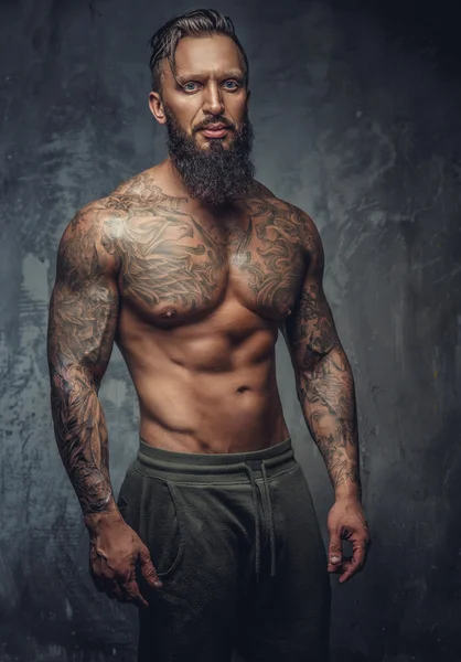 Tattooed muscular man