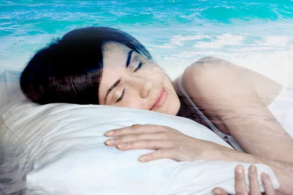 Double exposure  sleeping girl and blue ocean, dreams of the sea